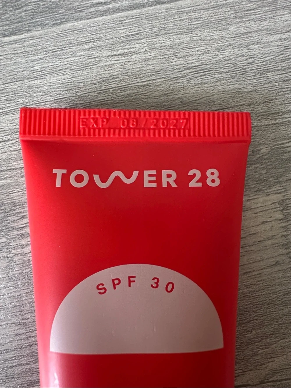 Tower 28 SPF 30 Sunscreen Gel in Bright Red Tube - Picture 2 of 4